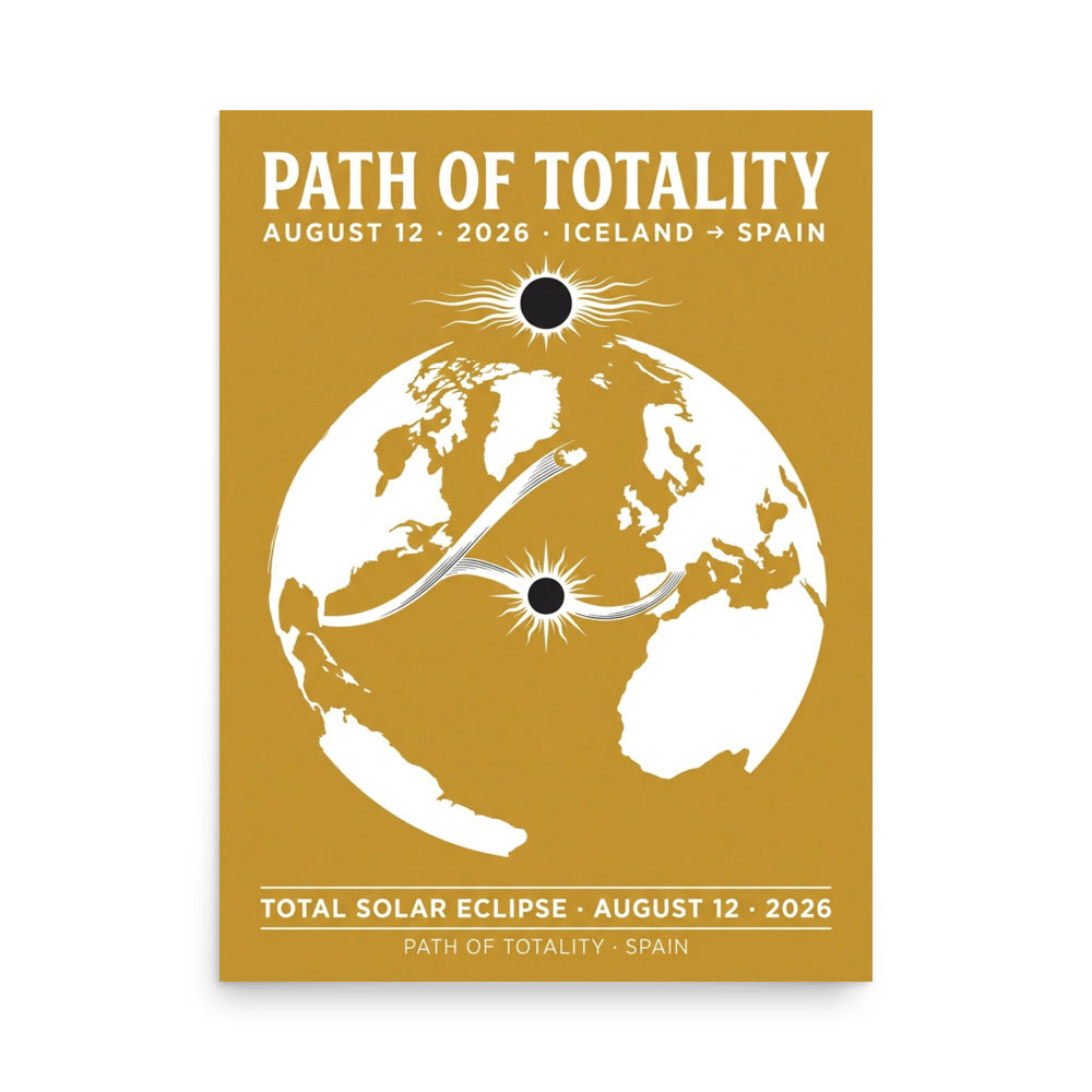 Framed 18x24 Path of Totality poster hanging on a wall, warm gold background with white world map silhouette and black eclipse disc, bold serif headline reading PATH OF TOTALITY, August 12 2026